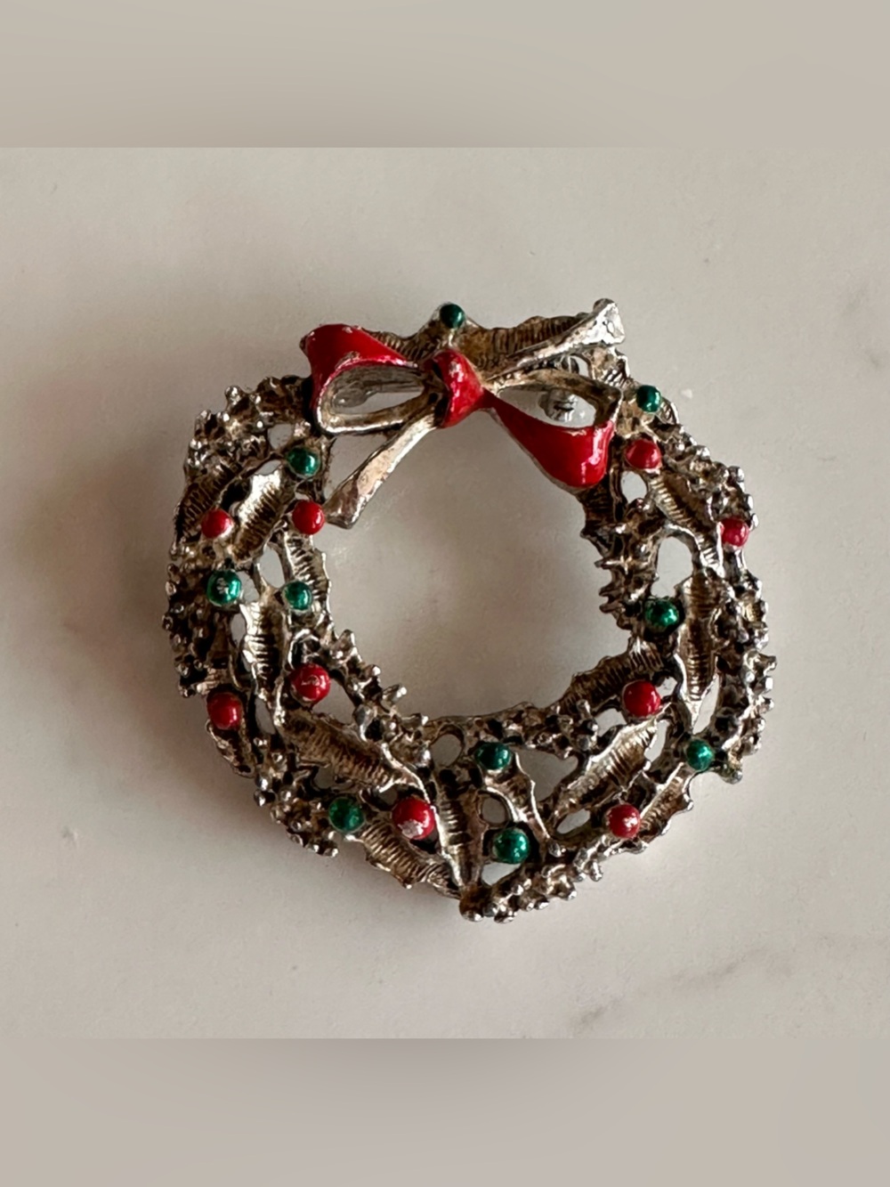 Vintage Silver-Tone Christmas Wreath Brooch with Red and Green Accents